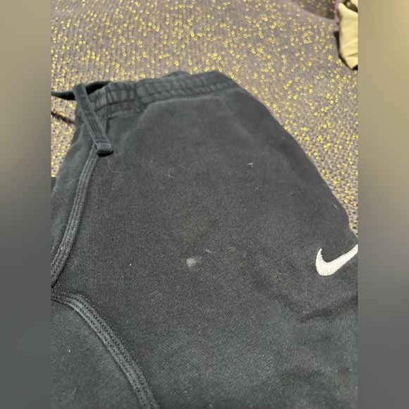 They are Nike sweat pants color is black and size small - Picture 2 of 3